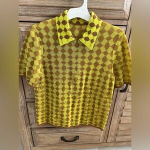 TORY BURCH
Jacquard Zip Polo In Toasted... Geometric Patterned Shirt